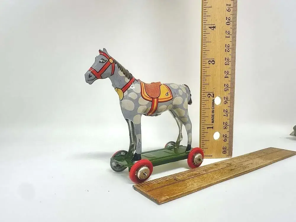 Miniature Tin Toy Horse on Wheels Vintage Penny Toy Ornament by Schylling